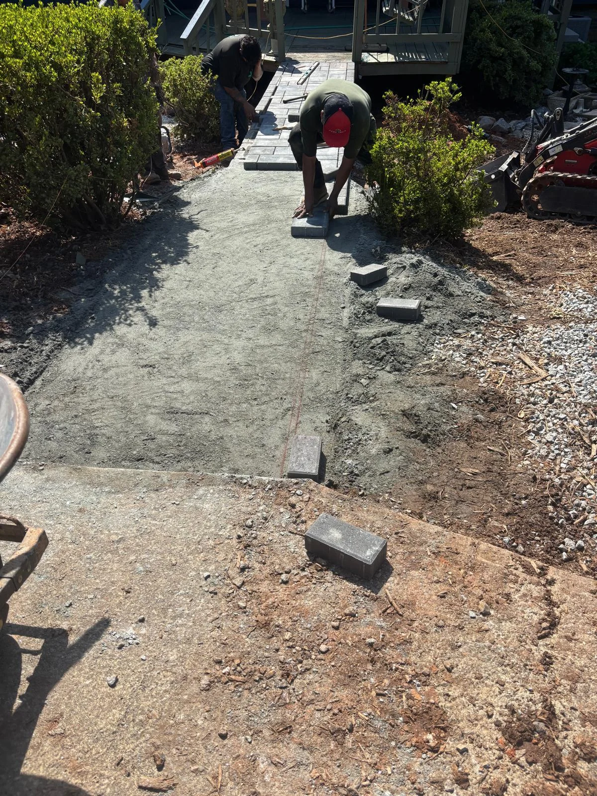 Paver walkway base preparation and installation