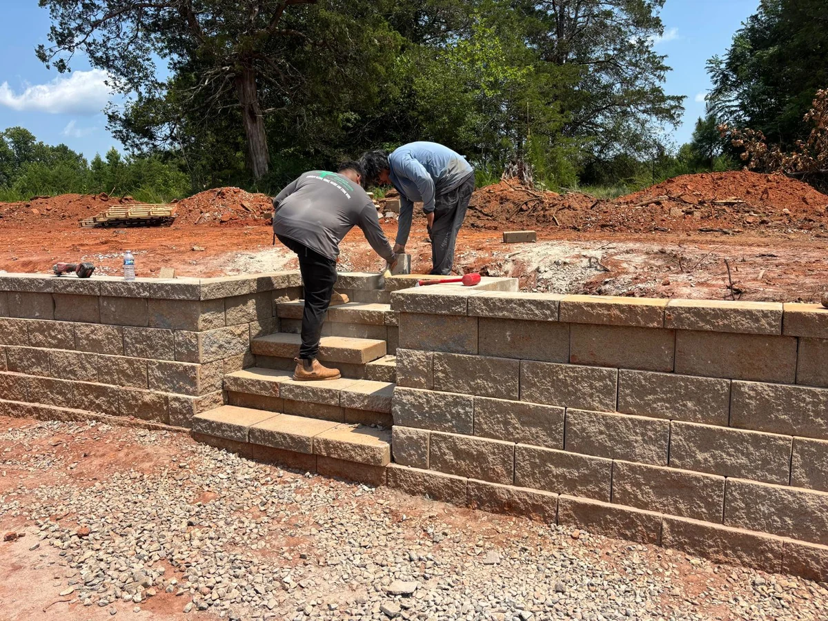Retaining wall with integrated steps under construction